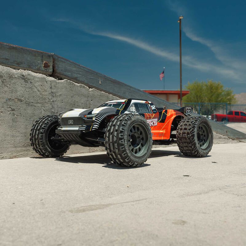 ARRMA ARA3205ST1+SPMXPSS100 1/10 VORTEKS MEGA 550 Brushed 2WD Stadium Truck RTR with Battery &amp; Charger, Orange