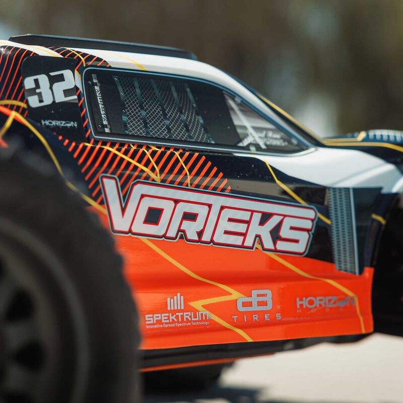 ARRMA ARA3205ST1+SPMXPSS100 1/10 VORTEKS MEGA 550 Brushed 2WD Stadium Truck RTR with Battery &amp; Charger, Orange