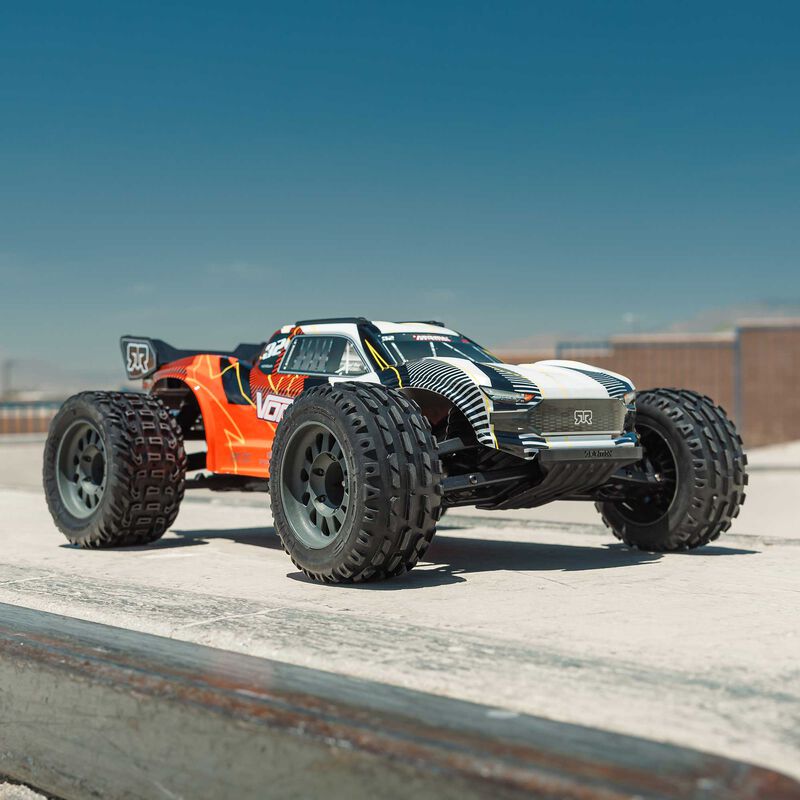 ARRMA ARA3205ST1+SPMXPSS100 1/10 VORTEKS MEGA 550 Brushed 2WD Stadium Truck RTR with Battery &amp; Charger, Orange