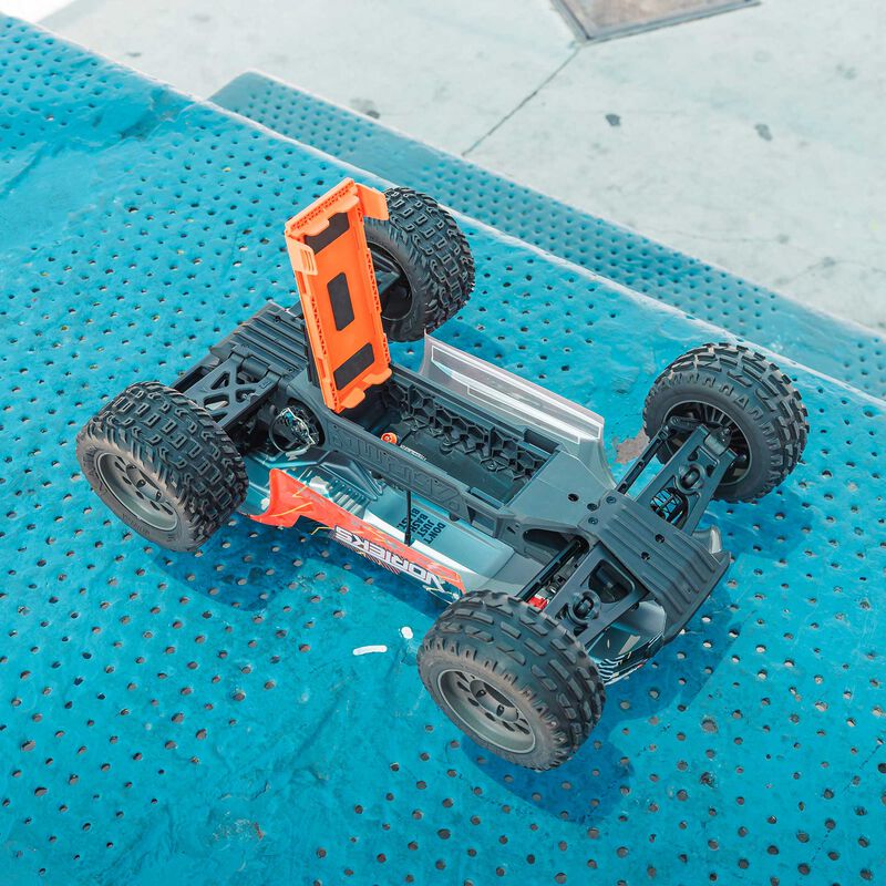 ARRMA ARA3205ST1+SPMXPSS100 1/10 VORTEKS MEGA 550 Brushed 2WD Stadium Truck RTR with Battery &amp; Charger, Orange
