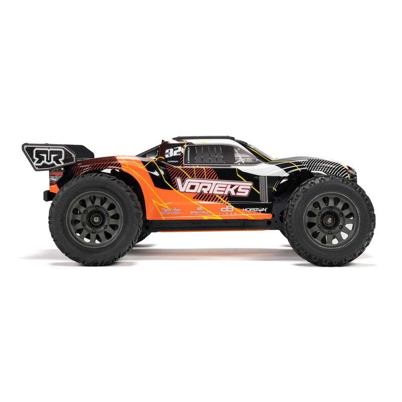 ARRMA ARA3205ST1+SPMXPSS100 1/10 VORTEKS MEGA 550 Brushed 2WD Stadium Truck RTR with Battery &amp; Charger, Orange