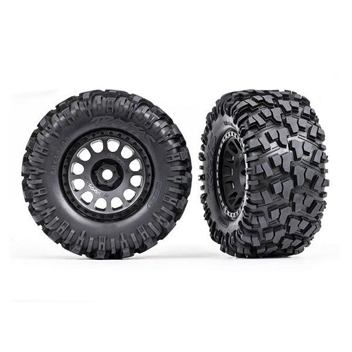 Traxxas 7875 - Tires & wheels assembled glued (XRT Race black wheels Maxx AT tires foam inserts) (8150707273965)
